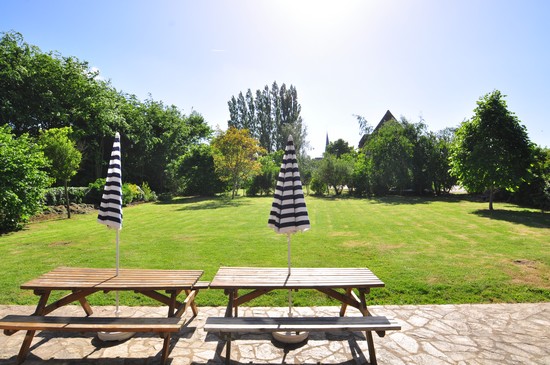 ** The patio tables await you for a pleasant outdoor dining **